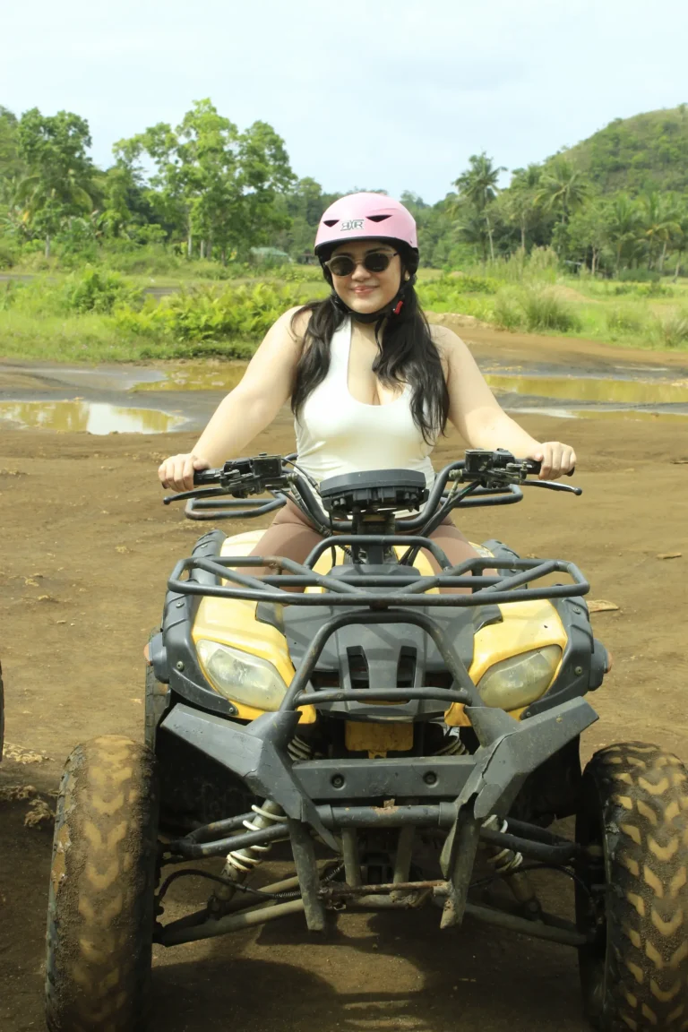 Nadz driving an ATV