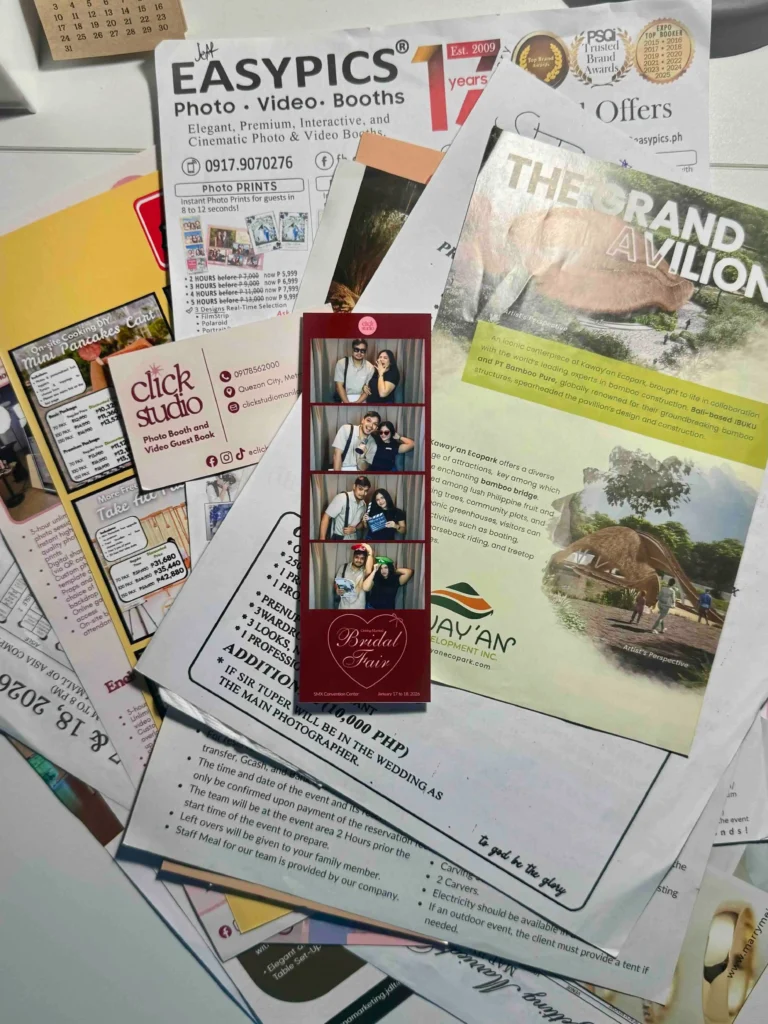 compilation of brochures, flyers, and calling cards received at Getting Married Bridal Fair